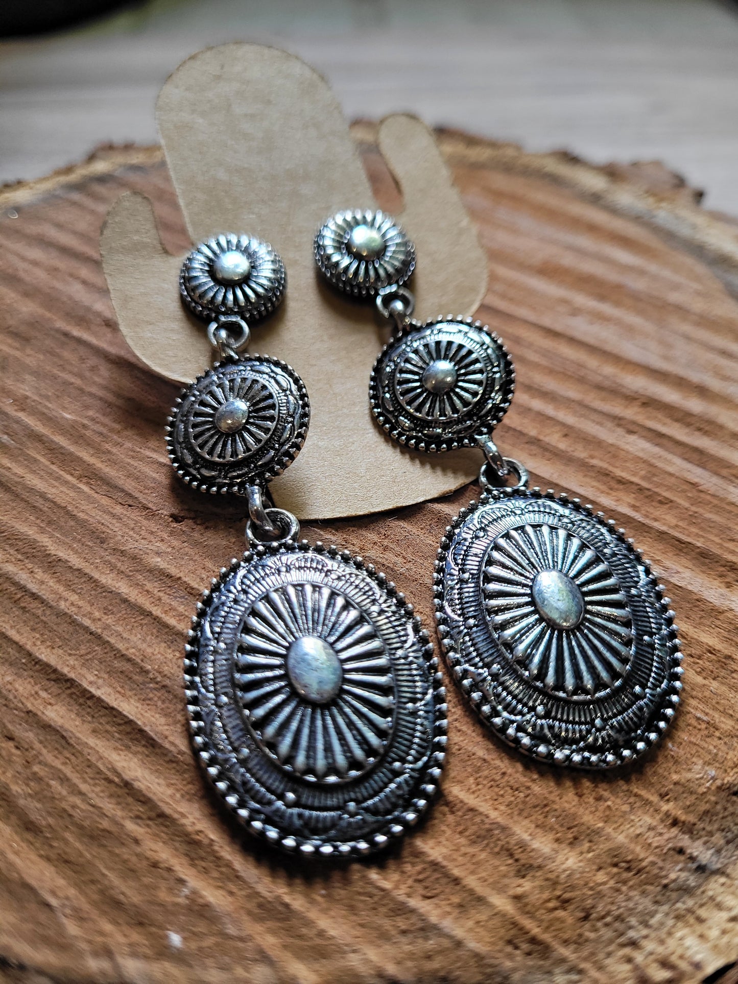 Sunburst design western dangle silver earrings