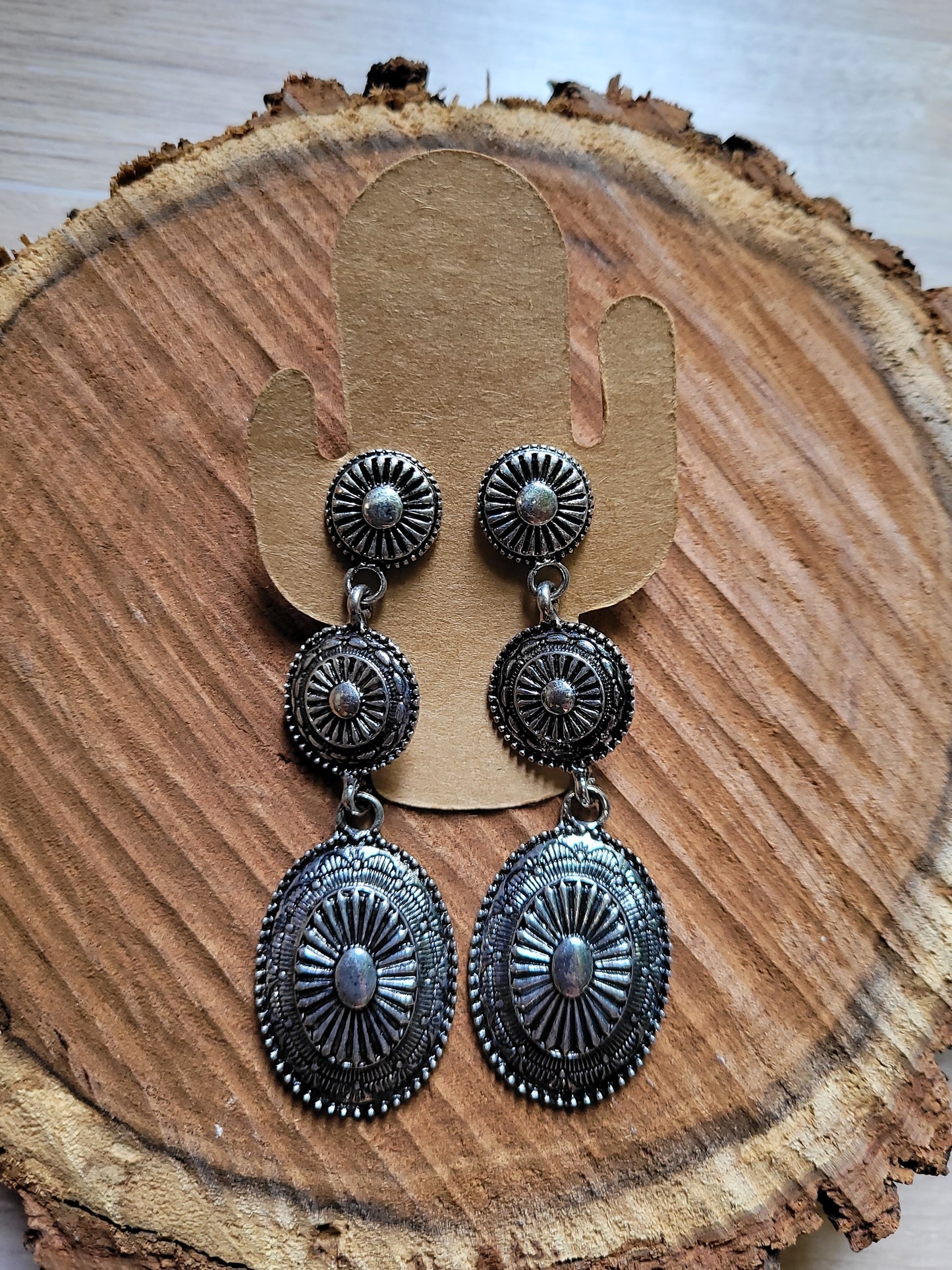 Sunburst design western dangle silver earrings