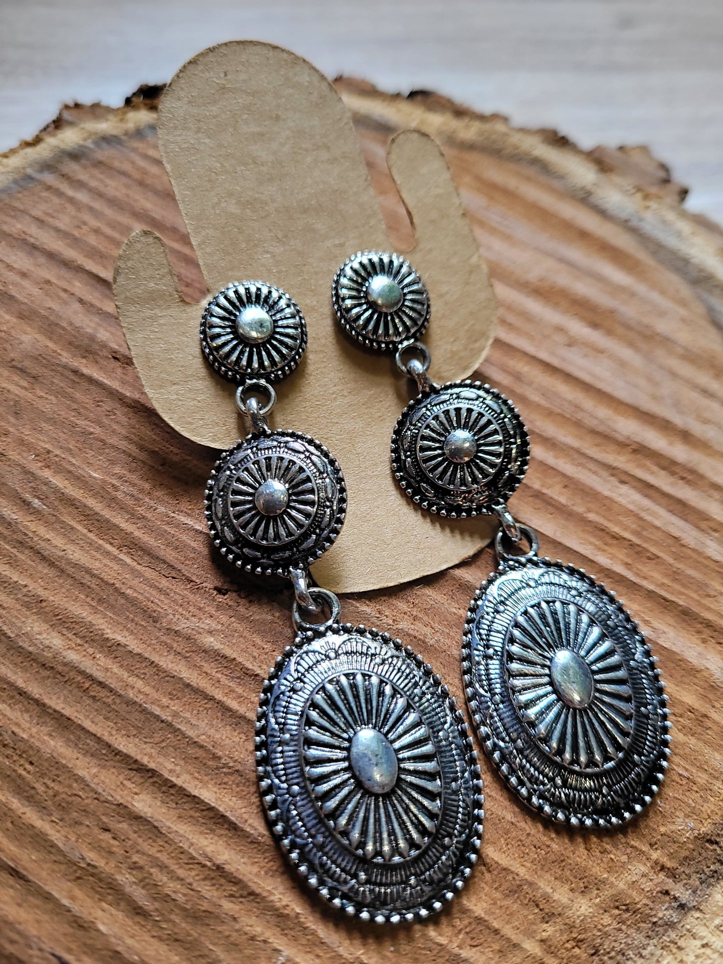 Sunburst design western dangle silver earrings