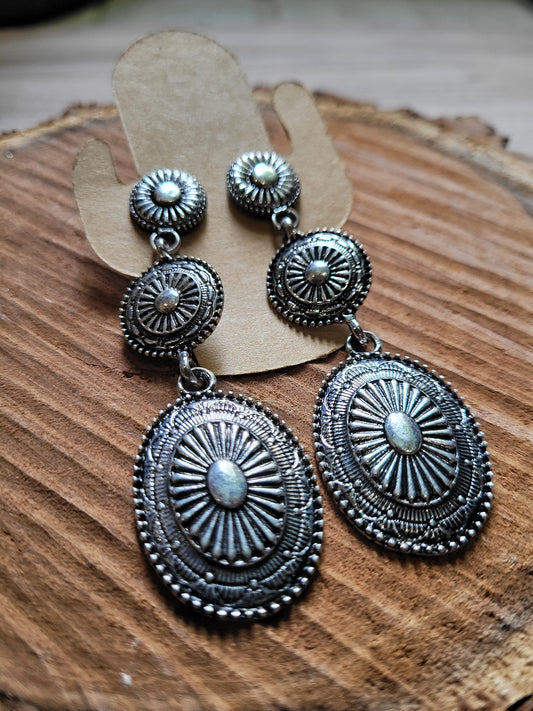 Sunburst design western dangle silver earrings